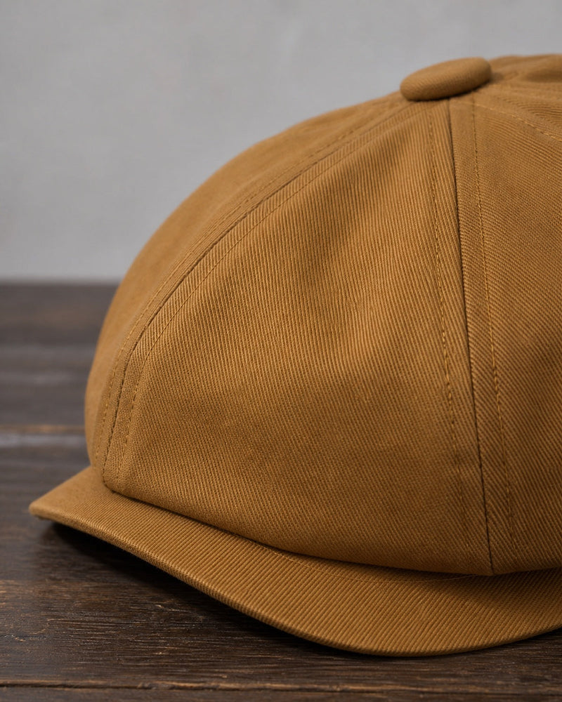 Detalhe da aba e costura da boina masculina italiana Brown em algodão