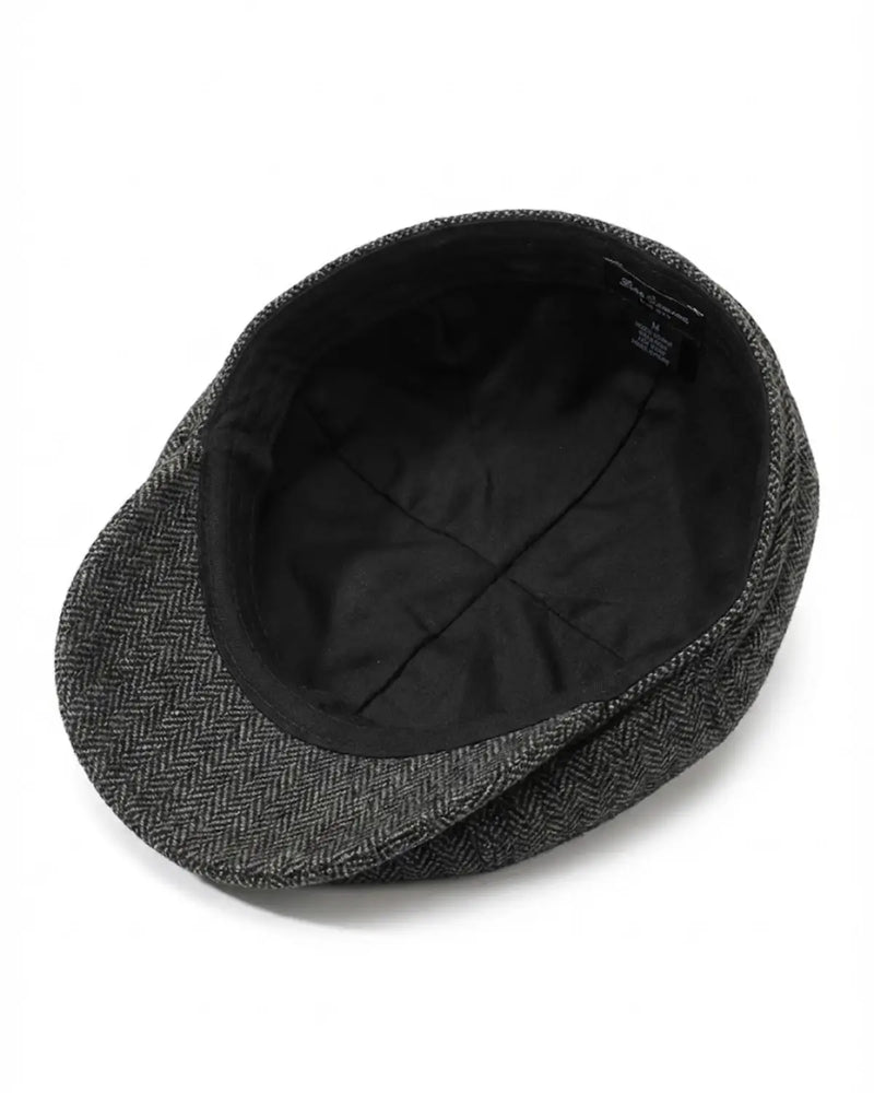 Parte interna da boina estilo Peaky Blinders com forro preto acolchoado e costuras reforçadas, demonstrando o acabamento premium e conforto térmico.